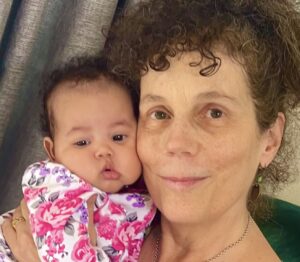 Mary Oak with grandchild